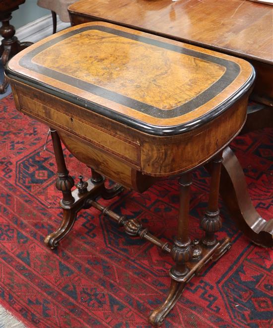 A Victorian walnut games/work table W.64cm